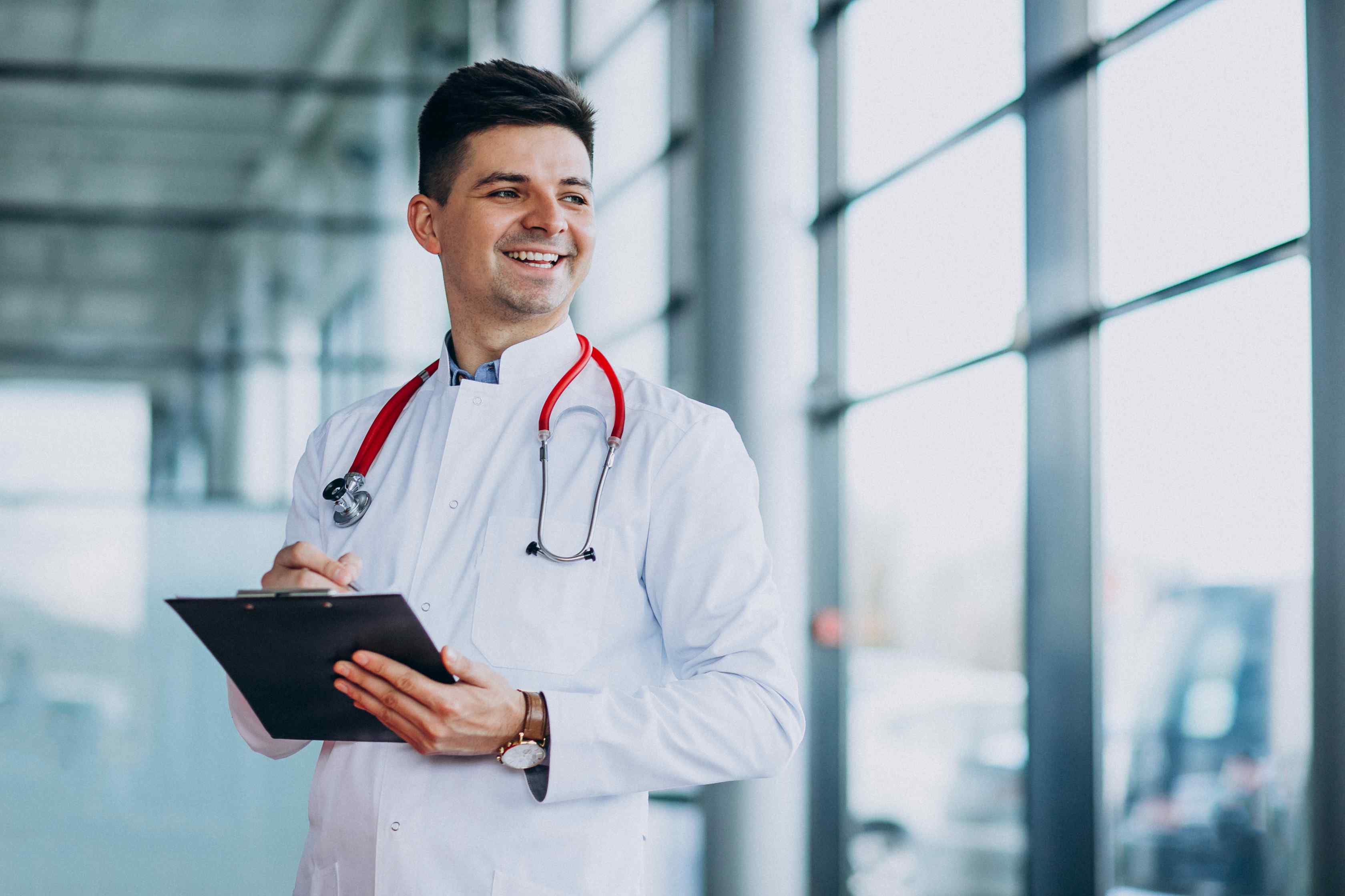 young-handsome-physician-medical-robe-with-stethoscope.jpg