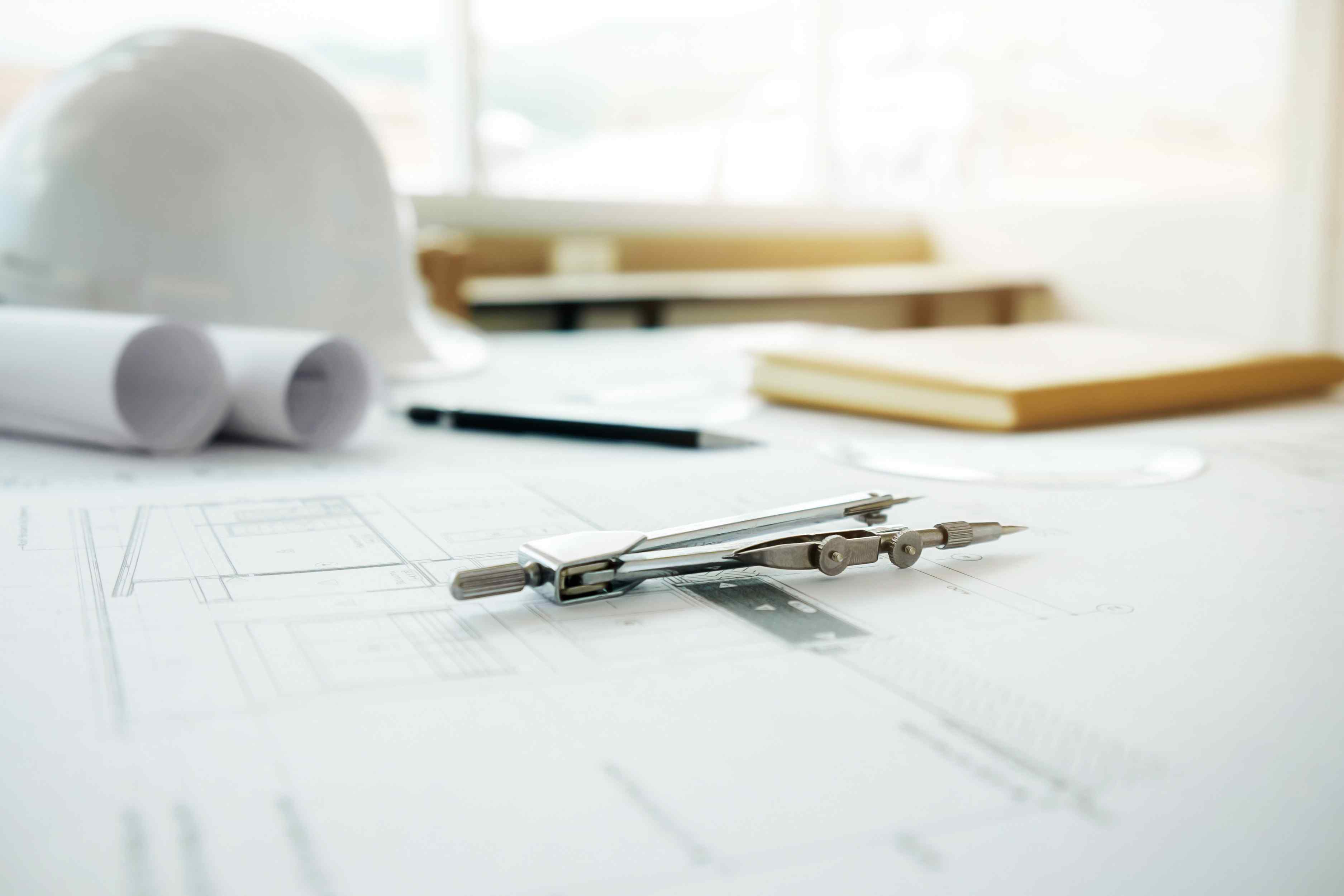 image-engineering-objects-workplace-top-view-construction-concept-engineering-tools-vintage-tone-retro-filter-effect-soft-focus-selective-focus (1).jpg